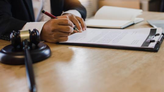 creating an estate plan next to a gavel.