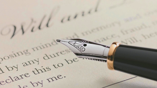 Last Will and Testament document with pen