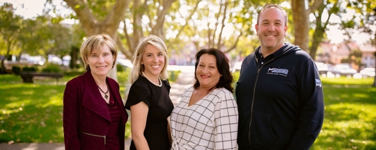 group photo in a park like setting